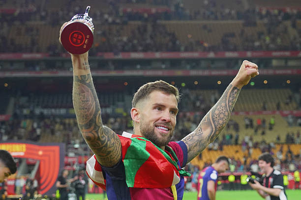 Click image for larger version

Name:	seville-spain-inigo-martinez-of-fc-barcelona-poses-with-a-reproduction-of-the-cup-during-the.jpg
Views:	5
Size:	65.8 KB
ID:	33750