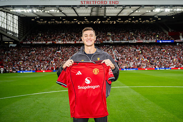 Click image for larger version

Name:	manchester-england-new-manchester-united-signing-benjamin-sesko-poses-with-a-team-shirt-prior.jpg
Views:	3
Size:	97.8 KB
ID:	34174