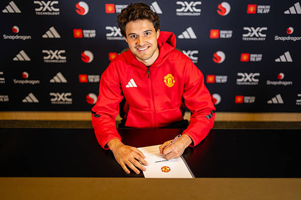 Click image for larger version

Name:	manchester-england-senne-lammens-of-manchester-united-poses-after-signing-for-the-club-at.jpg
Views:	3
Size:	58.8 KB
ID:	36392