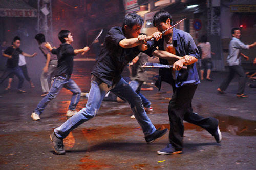 Năm Cam và tuổi thơ góc chợ tối: nơi một đời giang hồ bắt đầu từ đó