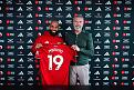 manchester-england-bryan-mbeumo-of-manchester-united-poses-with-director-of-football-jason.jpg