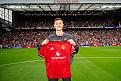 manchester-england-new-manchester-united-signing-benjamin-sesko-poses-with-a-team-shirt-prior.jpg