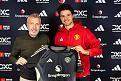 manchester-england-senne-lammens-of-manchester-united-poses-with-director-of-football-jason.jpg